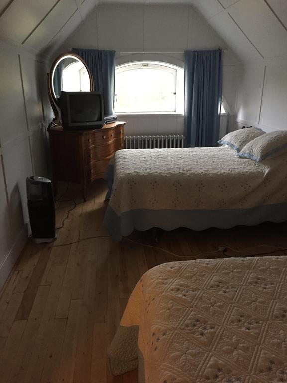 Le Petit Chateau Montebello B&B Habitación foto